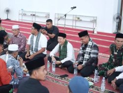 Pj Bupati Kampar Lepas Kegiatan Ziarah Kubur di Desa Uwai